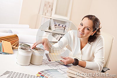 Young female interior designer working at office Stock Photo