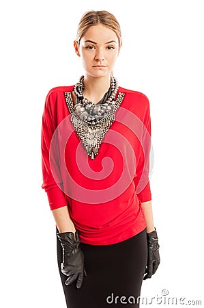 Young female model wearing red blouse with many accessories Stock Photo