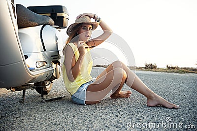 Young female on motorcycle trip Stock Photo
