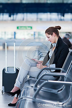 Young female passenger at the airport, Stock Photo