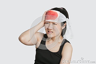 Young female with serious head injury Stock Photo