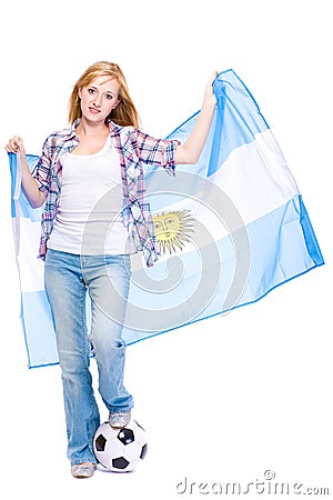 Young female soccer fan, argentina flag and ball Stock Photo