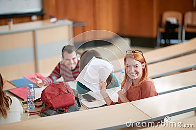 Young female student happy about her scores of the exam Stock Photo