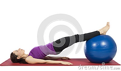 Young fitness woman working her abs with pilates ball Stock Photo