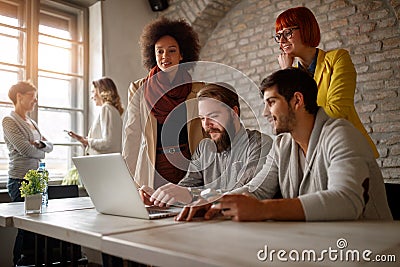 Young freelance web designers brainstorming Stock Photo