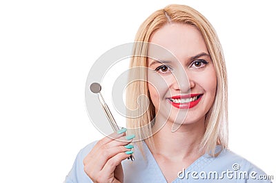 Young, friendly and beautiful dentist woman Stock Photo