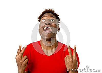 Young friendly and happy afro american man smiling excited and posing cool and cheerful Stock Photo