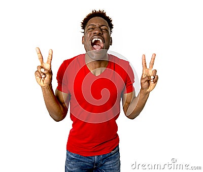 Young friendly and happy afro american man smiling excited and posing cool and cheerful Stock Photo