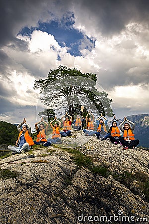 Young friends having fun on the picnic on the island of Norway Stock Photo