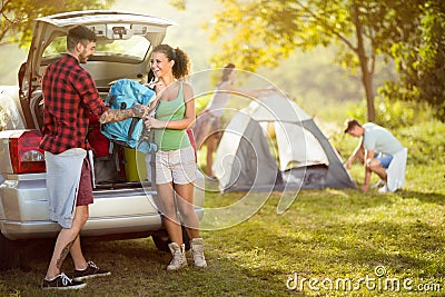 Young friends just came to camping trip Stock Photo