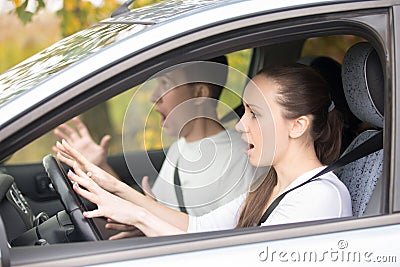 Young frightened driver woman and a man Stock Photo