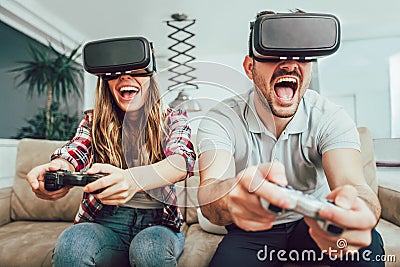 Young funny couple playing video games Stock Photo