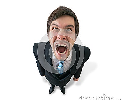 Young funny crazy businessman or boss is shouting. Isolated on white. Stock Photo