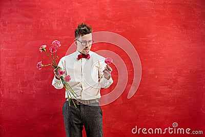 Young funny man with broken bouquet Stock Photo