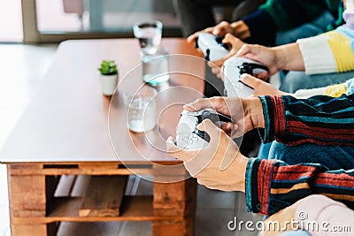 Young gamers playing online video game console at home Stock Photo