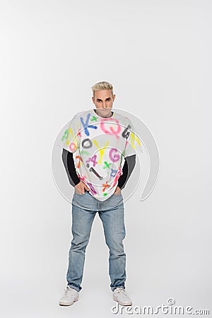 young gay man in alphabet print Stock Photo