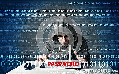 Young geek hacker stealing password Stock Photo