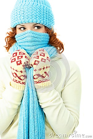 Young ginger woman wearing warm winter clothes Stock Photo
