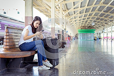 Young girl asian backpack travel using smartphone Stock Photo