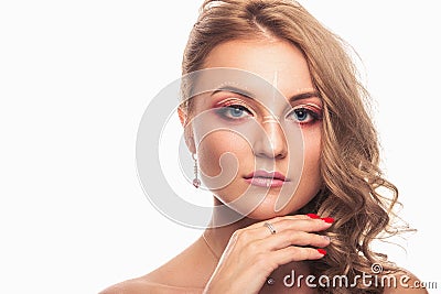 A young girl with a beautiful make-up and light brown hair. Studio shot on white background Stock Photo