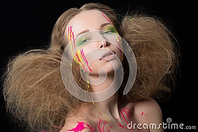 Young girl bedraggled with colorful dye Stock Photo