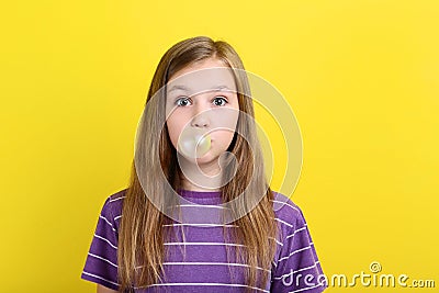 Girl blowing bubble gum Stock Photo