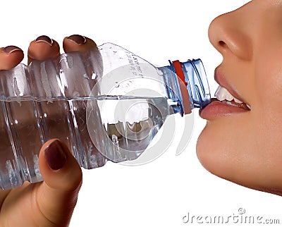 Young girl with bottle of mineral water Stock Photo