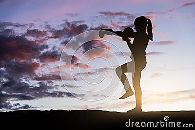 Young girl boxing at sunset. Stock Photo