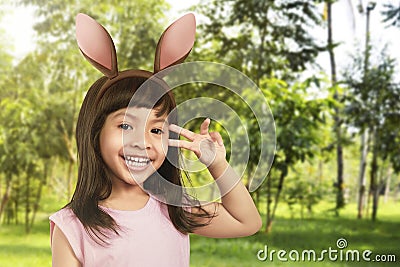 Young girl with bunny ears Stock Photo