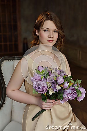 Young girl in classical interior Stock Photo