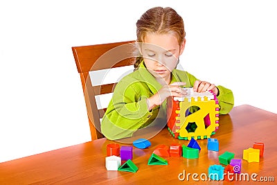 Young girl with cube Stock Photo