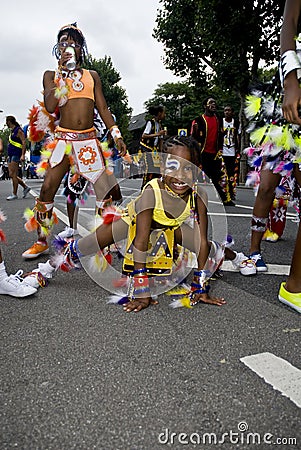 Young girl dancing at the carnival Editorial Stock Photo