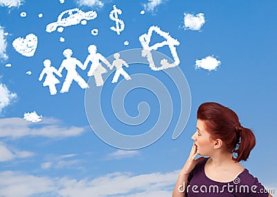 Young girl daydreaming with family and household clouds Stock Photo