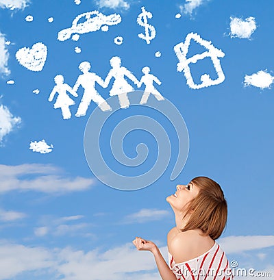 Young girl daydreaming with family and household clouds Stock Photo