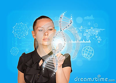 Young girl in dress pushing finger on model of DNA Stock Photo