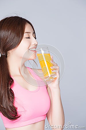 Young girl drink orange juice Stock Photo