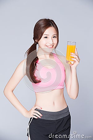 Young girl drink orange juice Stock Photo