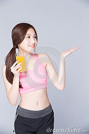 Young girl drink orange juice Stock Photo