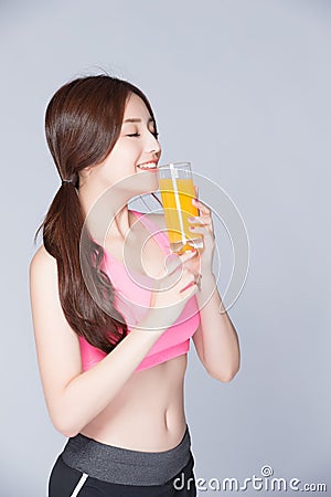 Young girl drink orange juice Stock Photo