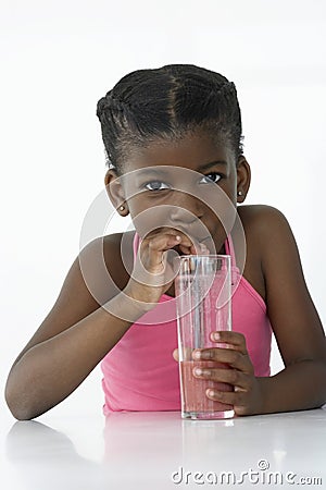 Young Girl Drinking Mocktail Stock Photo