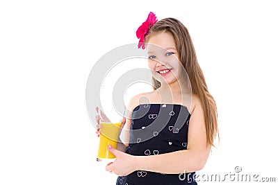 Young girl with glass of orange juice. Stock Photo