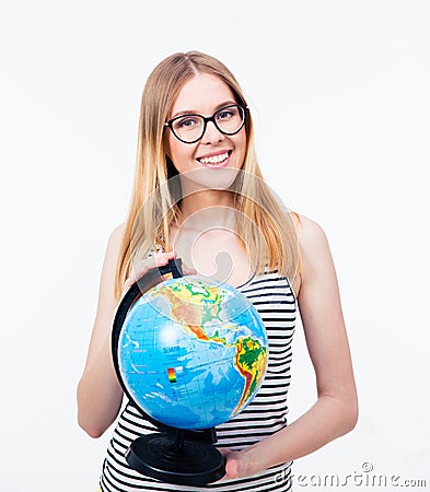 Young girl in glasses holding world globe Stock Photo