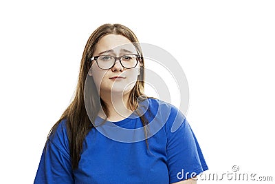 Young girl in glasses with a mournful face. Problems and helplessness. Isolated on a white background Stock Photo