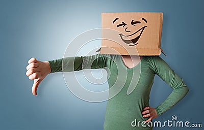 Young girl with happy cardboard box face Stock Photo