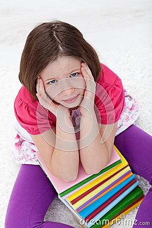 Young girl with headache from too much learning Stock Photo