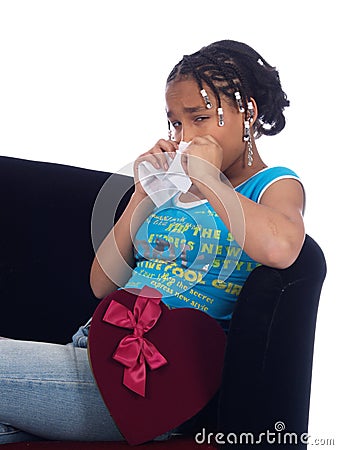 Young girl with a heartache Stock Photo