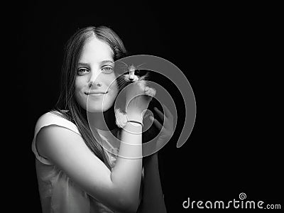 Young girl and her kitty black and white portrait Stock Photo