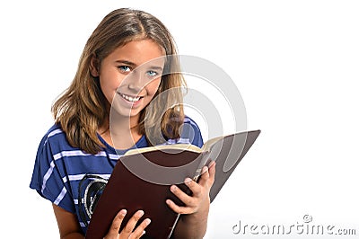 Young Girl Holding Bible Stock Photo