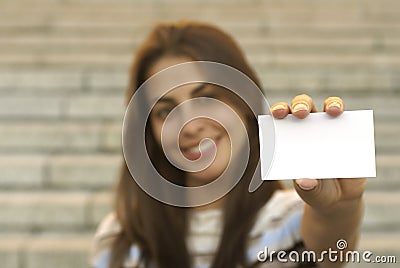 Young girl holding business card Stock Photo