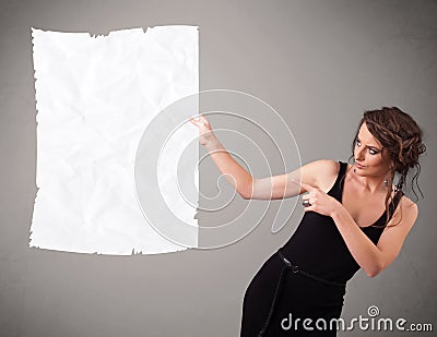 Young girl holding crumpled white paper copy space Stock Photo